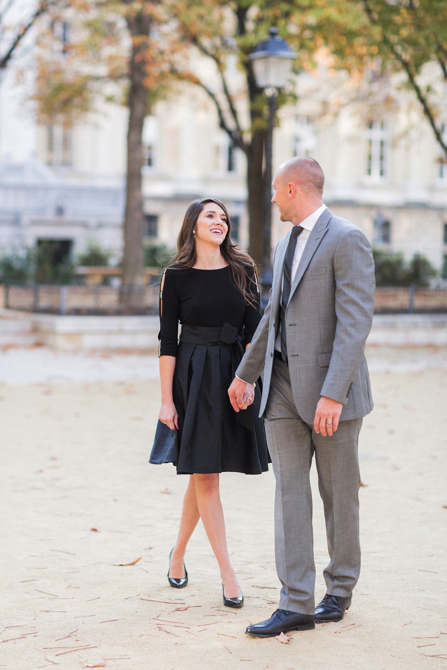 A perfect black dress and suit for this Paris engagement shoot