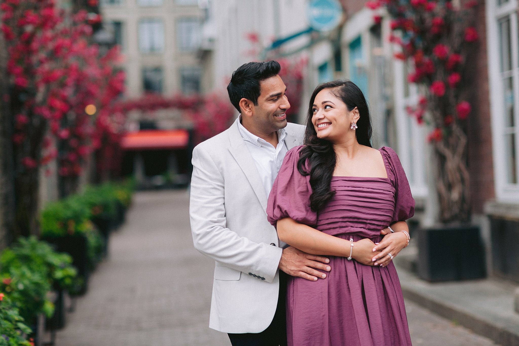 Lovebirds exploring Montreal together during their engagement session