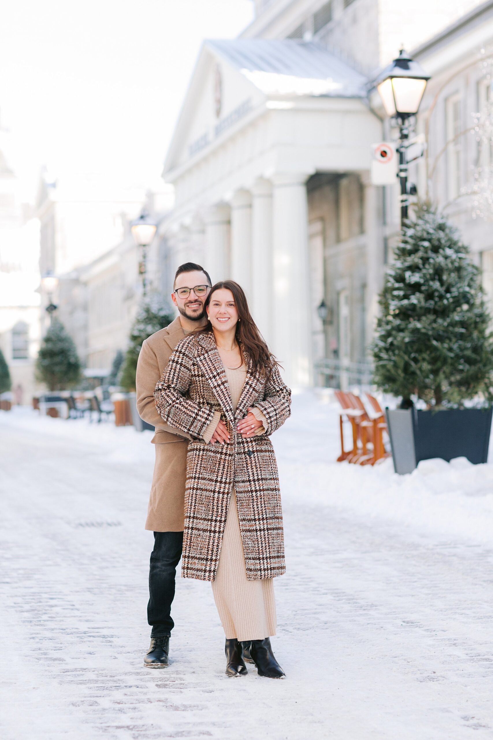 Old Port engagement shoot with a couple celebrating their love in the snow.